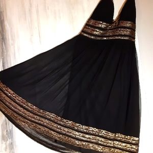 Black and beaded halter dress.